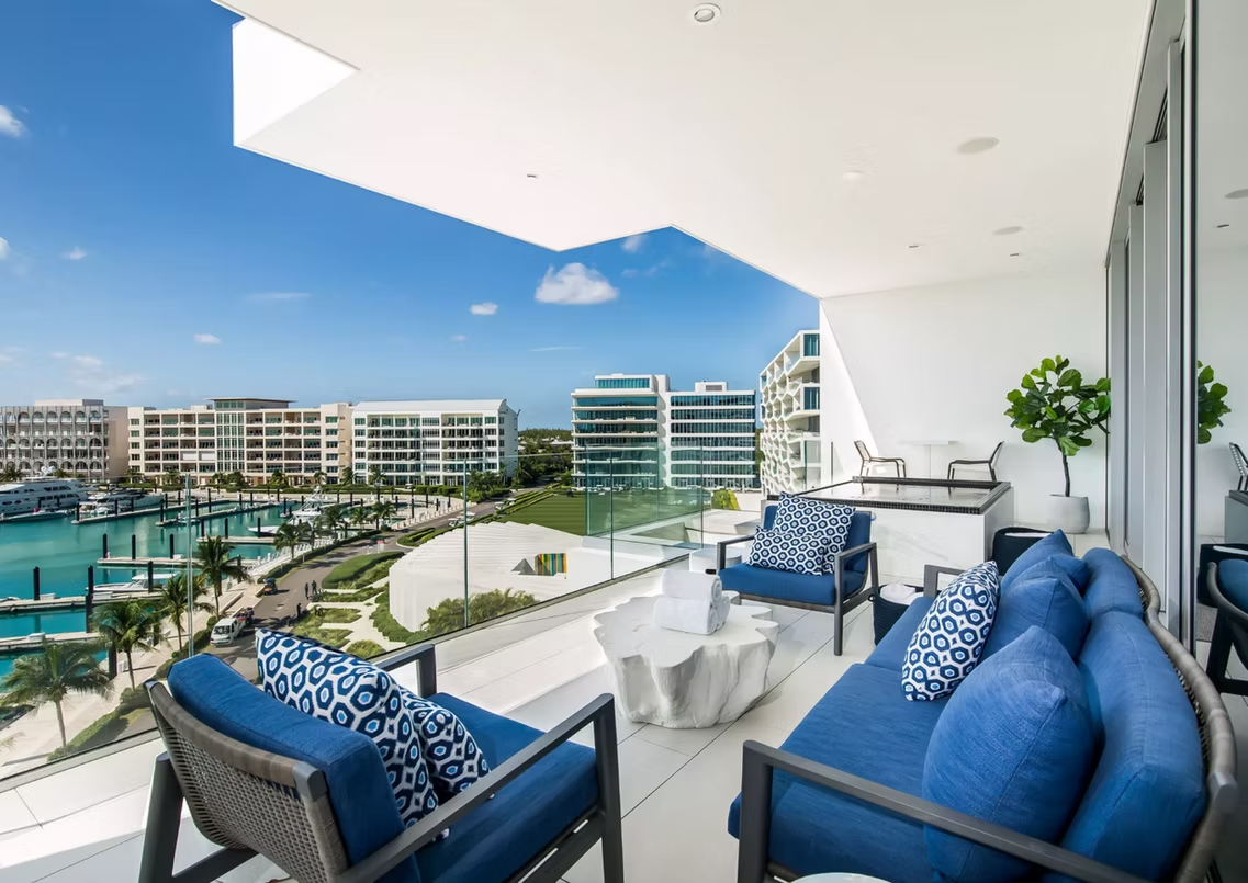 Albany luxury marina resort balcony with impact glass walls, Bahamas